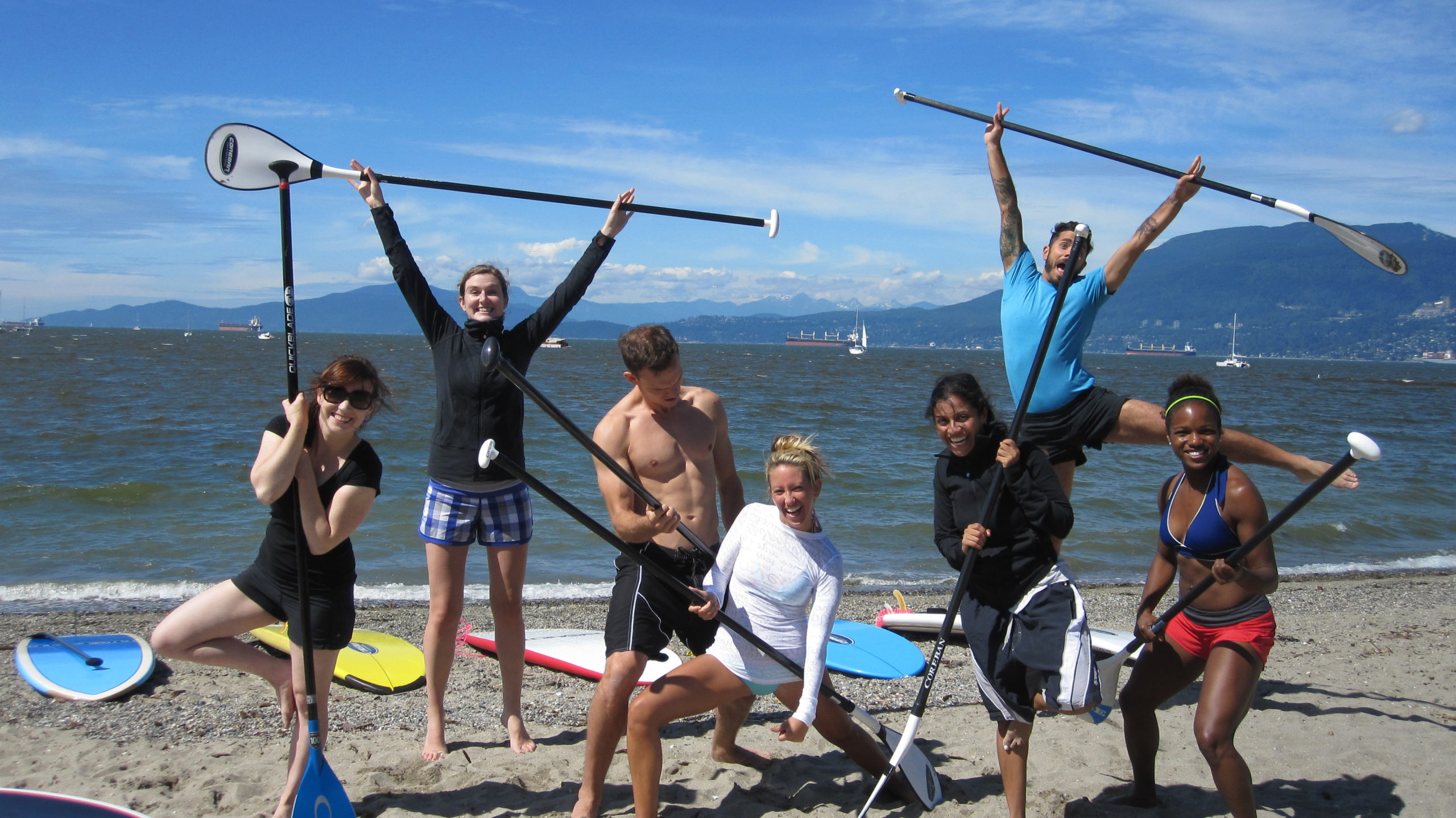 Kirsty and clients Stand Up Paddle Boarding in Vancouver